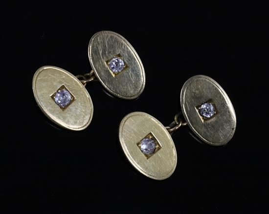 A pair of 18ct gold and diamond set oval cufflinks,